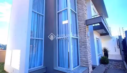 Casa em condomínio fechado com 3 quartos à venda na Sargento Abreu, 30, Pátria Nova, Novo Hamburgo, 148 m2 por R$ 1.100.000