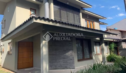 Casa em condomínio fechado com 4 quartos à venda na Rua Tenente Ary Tarrago, 1901, Jardim Itu Sabará, Porto Alegre, 447 m2 por R$ 1.600.000