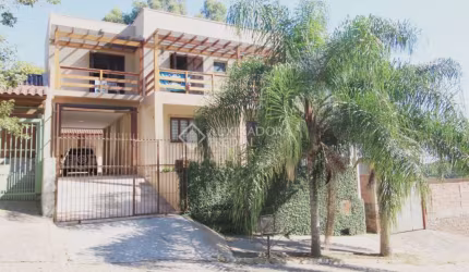 Casa em condomínio fechado com 4 quartos à venda na Rua Porto Alegre, 574, Encosta do Sol, Estância Velha, 268 m2 por R$ 720.000