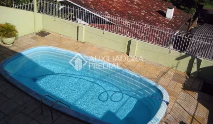Casa em condomínio fechado com 4 quartos à venda na Rua Júlio Adams, 146, Guarani, Novo Hamburgo, 205 m2 por R$ 477.000