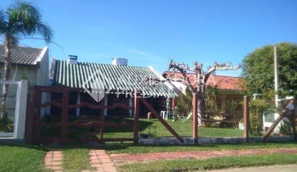 Casa em condomínio fechado com 3 quartos à venda na GOVERNADOR ERNESTO DORNELES, 1935, Zona Nova, Tramandaí, 171 m2 por R$ 380.000