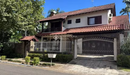 Casa em condomínio fechado com 4 quartos à venda na Rua Encruzilhada do Sul, 505, Mauá, Novo Hamburgo, 238 m2 por R$ 980.000