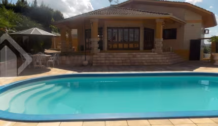 Casa em condomínio fechado com 5 quartos à venda na DONA EMILIANA, 482, Centro, Portão, 456 m2 por R$ 2.280.000
