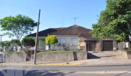 Casa em condomínio fechado com 4 quartos à venda na Avenida General Daltro Filho, 1809, Canudos, Novo Hamburgo, 300 m2 por R$ 1.060.000