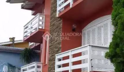 Casa em condomínio fechado com 3 quartos à venda na Rua Osvaldo Cruz, 1473, Primavera, Novo Hamburgo, 399 m2 por R$ 890.000