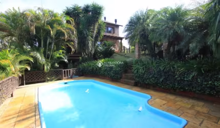 Casa em condomínio fechado com 3 quartos à venda na Rua dos Sabiás, 710, Diva Lessa de Jesus, Gravataí, 360 m2 por R$ 2.650.000