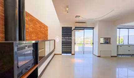 Casa em condomínio fechado com 3 quartos à venda na Rua Oscar Schneider, 485, Medianeira, Porto Alegre, 317 m2 por R$ 1.225.000