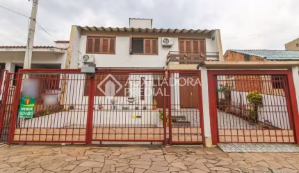 Casa em condomínio fechado com 5 quartos à venda na Rua Doutor Murtinho, 1097, Bom Jesus, Porto Alegre, 247 m2 por R$ 640.000