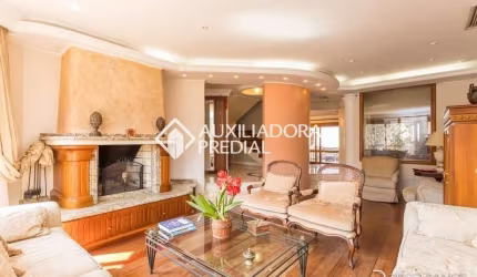Casa com 4 quartos à venda na Rua Chiriguano, 227, Vila Assunção, Porto Alegre, 470 m2 por R$ 1.650.000