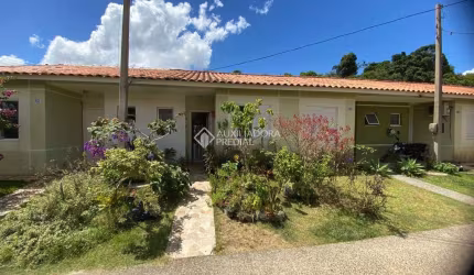 Casa em condomínio fechado com 2 quartos à venda na Jozino Liotti, 300, Jardim Algarve, Alvorada, 43 m2 por R$ 195.000