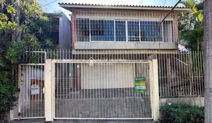 Casa em condomínio fechado com 3 quartos à venda na Rua Antônio Ribeiro, 321, Santo Antônio, Porto Alegre, 231 m2 por R$ 600.000
