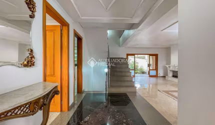 Casa em condomínio fechado com 3 quartos à venda na Rua Licínio Cardoso, 305, Chácara das Pedras, Porto Alegre, 548 m2 por R$ 2.960.000