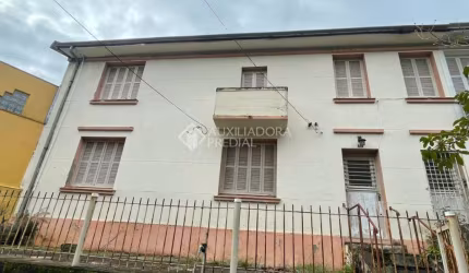 Casa com 4 quartos à venda na Rua Faria Santos, 62, Petrópolis, Porto Alegre, 232 m2 por R$ 749.000