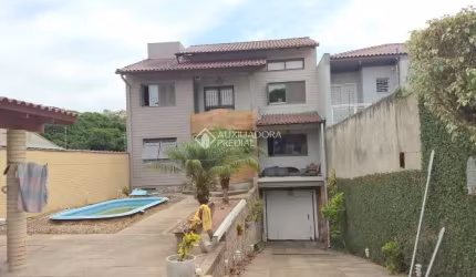 Casa com 3 quartos à venda na Rua Gregório da Fonseca, 167, Nonoai, Porto Alegre, 200 m2 por R$ 667.800