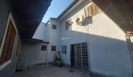 Casa com 2 quartos à venda na Avenida Orleaes, 840, Guarujá, Porto Alegre, 120 m2 por R$ 410.000