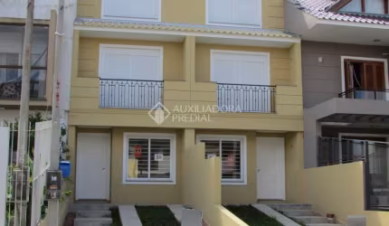 Casa em condomínio fechado com 3 quartos à venda na Rua Nestor José Nitschke, 38, Guarujá, Porto Alegre, 133 m2 por R$ 520.000
