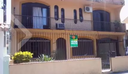 Casa em condomínio fechado com 4 quartos à venda na Rua Márcio Dias, 340, Nonoai, Porto Alegre, 450 m2 por R$ 700.000