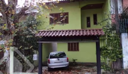 Casa em condomínio fechado com 3 quartos à venda na Rua Pedro Velho, 264, Partenon, Porto Alegre, 180 m2 por R$ 390.000