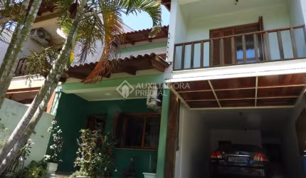 Casa em condomínio fechado com 3 quartos à venda na Rua Márcio Dias, 176, Nonoai, Porto Alegre, 317 m2 por R$ 780.800