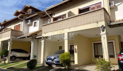 Casa em condomínio fechado com 3 quartos à venda na EDUARDO PRADO, 2165, 1954, Vila Nova, Porto Alegre, 186 m2 por R$ 1.450.000