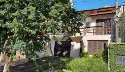 Casa com 3 quartos à venda na Avenida Doutor Francisco Roberto Dall Igna, 320, Espírito Santo, Porto Alegre, 196 m2 por R$ 650.000