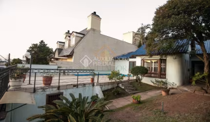 Casa em condomínio fechado com 5 quartos à venda na Rua Mozart, 133, Três Figueiras, Porto Alegre, 300 m2 por R$ 2.100.000