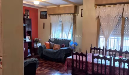 Casa com 3 quartos à venda na Rua Idelvira de Moura Almeida, 30, Jardim Leopoldina, Porto Alegre, 240 m2 por R$ 435.000