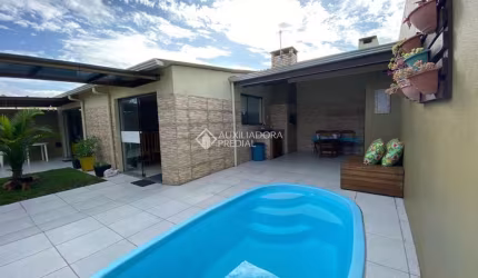 Casa com 4 quartos à venda na Josue Guimarães, 208, Mariluz (Distrito), Imbé, 111 m2 por R$ 490.000