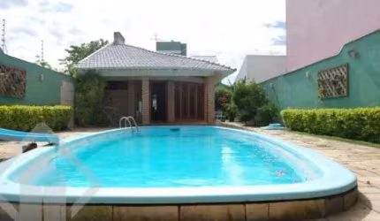 Casa em condomínio fechado com 4 quartos à venda na Rua Dulcimar Cardoso, 340, Paraíso, Sapucaia do Sul, 340 m2 por R$ 1.150.000