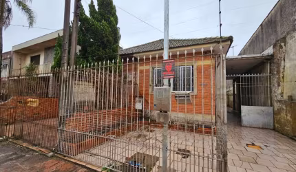Casa com 5 quartos à venda na Rua Ângelo Dourado, 346, Anchieta, Porto Alegre, 250 m2 por R$ 600.000