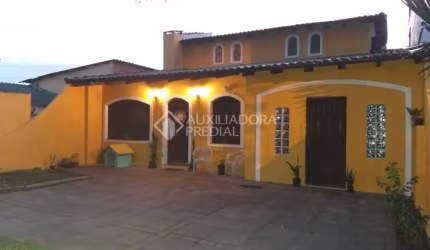 Casa em condomínio fechado com 3 quartos à venda na Rua Érico Cramer, 40, Camaquã, Porto Alegre, 309 m2 por R$ 639.000