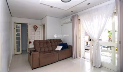Casa em condomínio fechado com 4 quartos à venda na Rua Vital Brasil, 69, Jardim Itu Sabará, Porto Alegre, 182 m2 por R$ 650.000