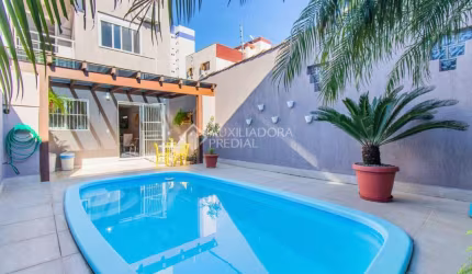Casa em condomínio fechado com 3 quartos à venda na Rua Leite de Castro, 46, Jardim Itu Sabará, Porto Alegre, 210 m2 por R$ 1.080.000