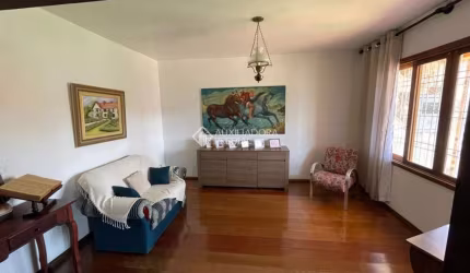 Casa com 3 quartos à venda na Rua Doutor Mário Totta, 1325, Tristeza, Porto Alegre, 363 m2 por R$ 850.000