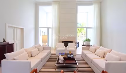 Casa em condomínio fechado com 3 quartos à venda na Avenida Juca Batista, 8000, Belém Novo, Porto Alegre, 450 m2 por R$ 5.250.000