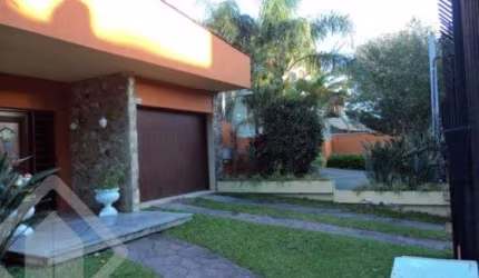 Casa com 5 quartos à venda na Rua Manoel Leão, 135, Pedra Redonda, Porto Alegre, 300 m2 por R$ 1.043.000