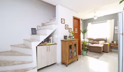 Casa em condomínio fechado com 2 quartos à venda na Rua Sebastião Wolf, 281, Nonoai, Porto Alegre, 78 m2 por R$ 290.000
