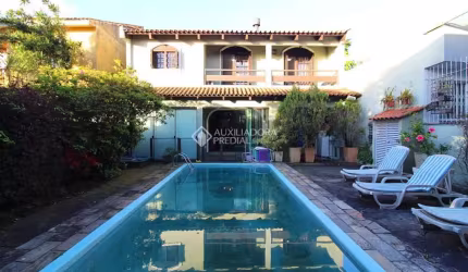 Casa com 4 quartos à venda na Rua Menezes Paredes, 238, Nonoai, Porto Alegre, 211 m2 por R$ 850.000