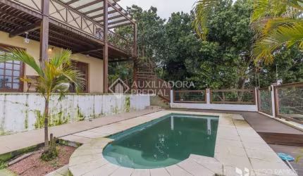 Casa com 4 quartos à venda na Rua Chiriguano, 265, Vila Assunção, Porto Alegre, 393 m2 por R$ 1.490.000