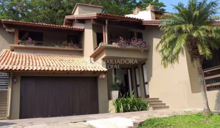 Casa em condomínio fechado com 3 quartos à venda na Rua Edgar Luiz Schneider, 510, Jardim Isabel, Porto Alegre, 310 m2 por R$ 1.330.000