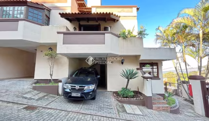 Casa em condomínio fechado com 3 quartos à venda na Avenida Wenceslau Escobar, 3714, Vila Conceição, Porto Alegre, 136 m2 por R$ 590.000