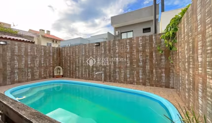 Casa com 3 quartos à venda na Rua Michael Motta Seelig, 36, Hípica, Porto Alegre, 133 m2 por R$ 450.000
