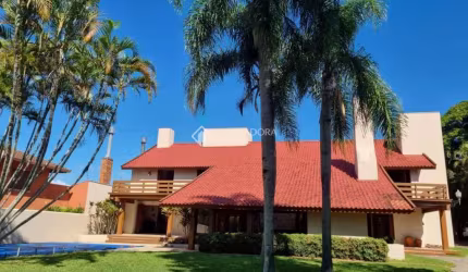 Casa em condomínio fechado com 5 quartos para alugar na Rua Potiguara, 245, Vila Assunção, Porto Alegre, 542 m2 por R$ 9.500
