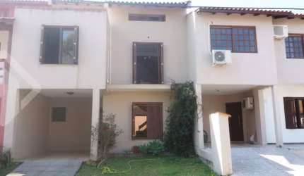 Casa em condomínio fechado com 3 quartos à venda na Rua Ponciano Pacheco da Silveira, 172, Guarujá, Porto Alegre, 185 m2 por R$ 480.000