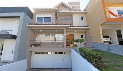 Casa em condomínio fechado com 3 quartos à venda na Avenida Altos do Santa Rita, 441, Hípica, Porto Alegre, 305 m2 por R$ 985.000