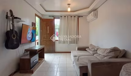 Casa com 2 quartos à venda na Avenida Alcibiades Martins da Rocha, 1861, Vila Operária, Porto Alegre, 63 m2 por R$ 245.000
