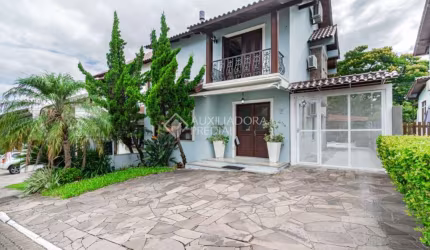 Casa em condomínio fechado com 3 quartos à venda na Avenida Edgar Pires de Castro, 540, Hípica, Porto Alegre, 220 m2 por R$ 895.000