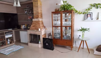 Casa em condomínio fechado com 3 quartos à venda na Rua Erechim, 293, Nonoai, Porto Alegre, 146 m2 por R$ 650.000