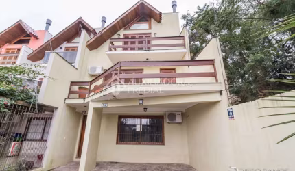 Casa com 3 quartos à venda na Rua Jayme Saul de Borba, 72, Espírito Santo, Porto Alegre, 191 m2 por R$ 598.000