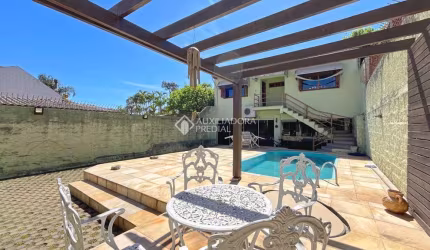Casa com 4 quartos à venda na Rua São Sebastião do Cai, 50, Camaquã, Porto Alegre, 235 m2 por R$ 749.000